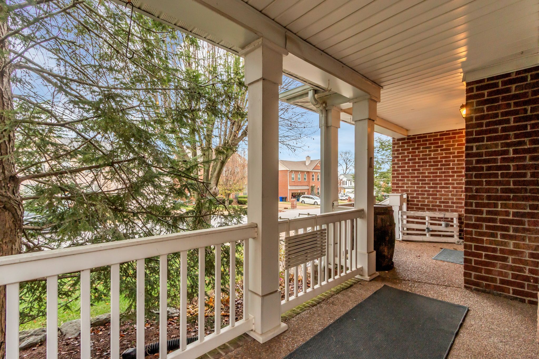 505 Hollyhock Way Franklin, TN 37064 - Photo 3 of 28 a view of a porch with wooden floor and fence