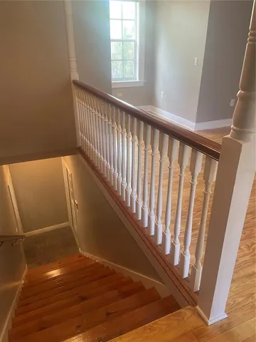 a view of entryway with wooden floor