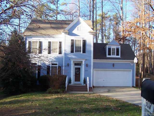 5017 Denham Court Raleigh, NC 27613 - Photo 1 of 11 a view of a yard in front of a house