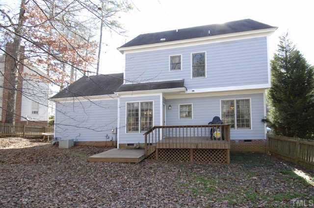 5017 Denham Court Raleigh, NC 27613 - Photo 11 of 11 a front view of a house with a yard