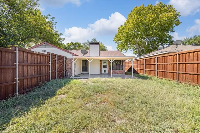 a view of backyard of house