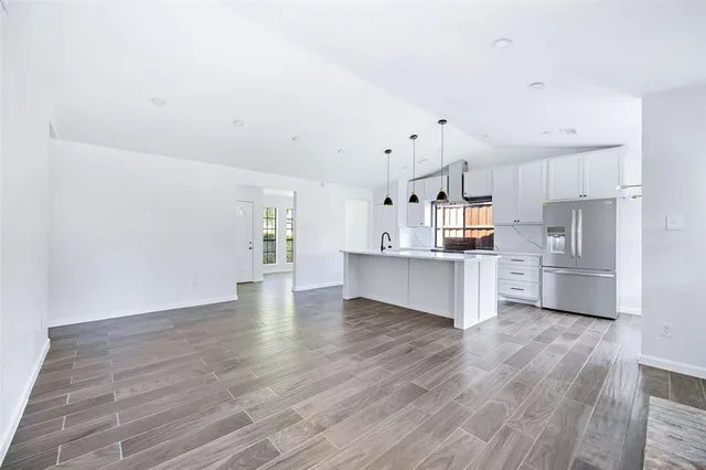 a view of kitchen with wooden floor