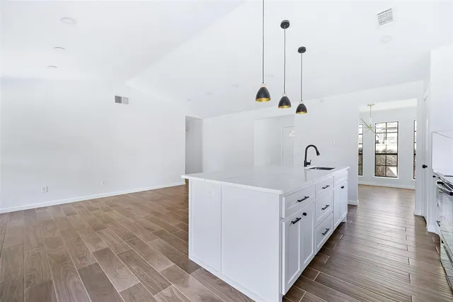 a very nice looking room with wooden floor