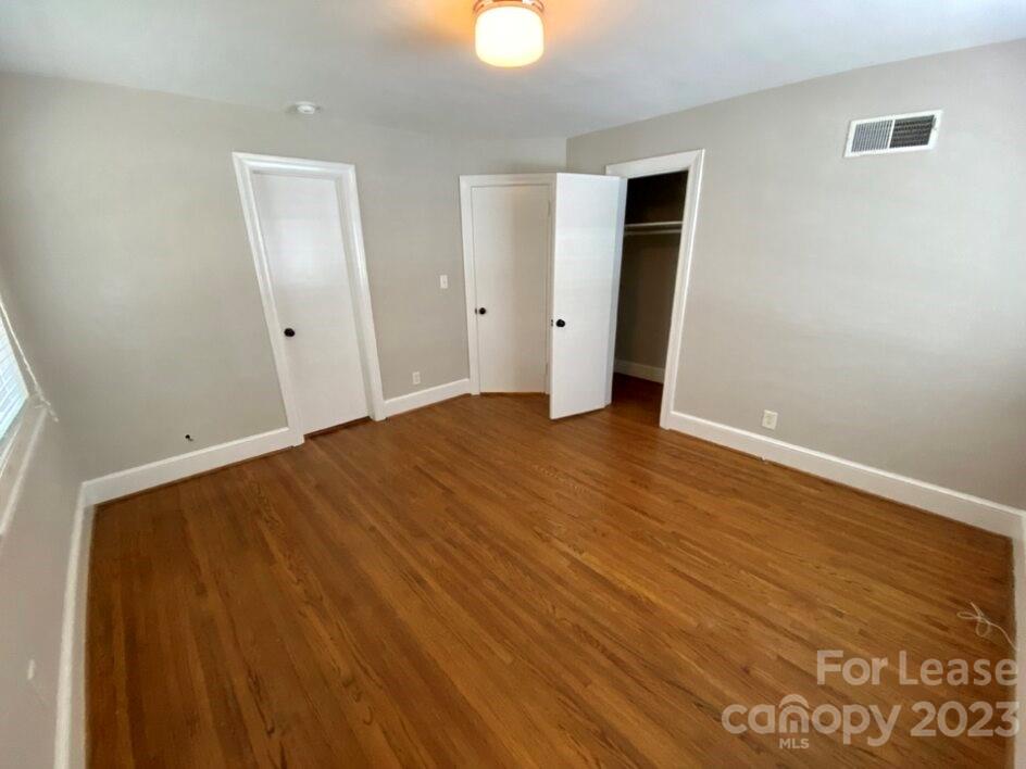 1708 Dilworth Road West, Unit 9 Charlotte, NC 28203 - Photo 11 of 14 wooden floor in an empty room