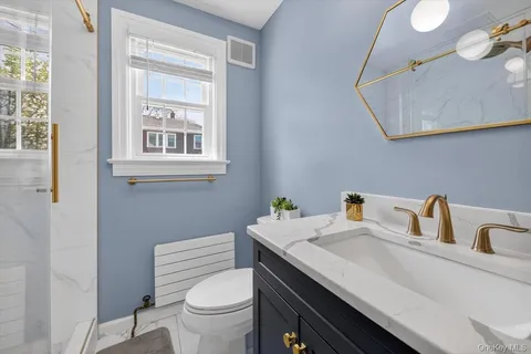 a bathroom with a sink and a toilet