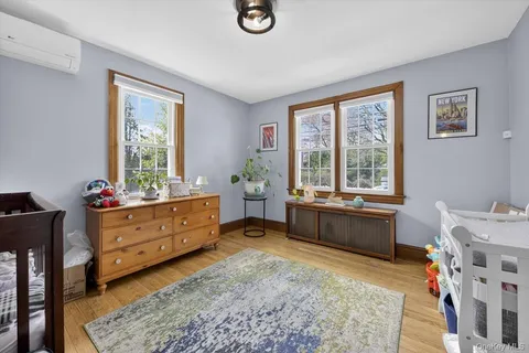 a room with furniture and a window