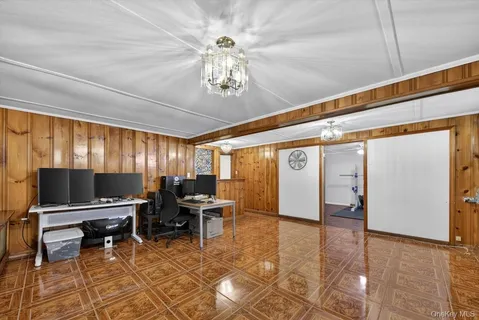a view of a livingroom with furniture