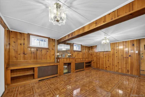 a large kitchen with a stove and refrigerator