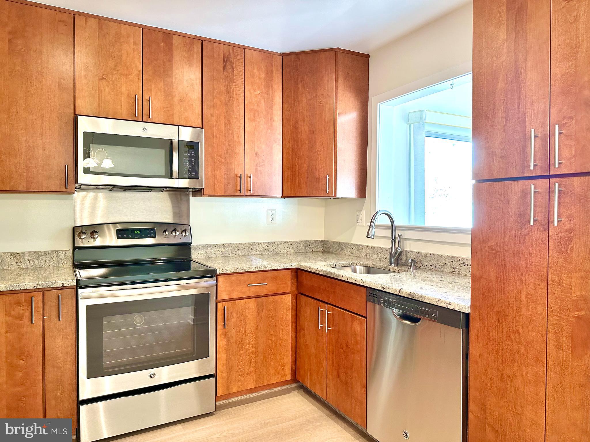 3309 Solomons Court, Unit 102C Silver Spring, MD 20906 - Photo 11 of 36 Updated kitchen has granite counters