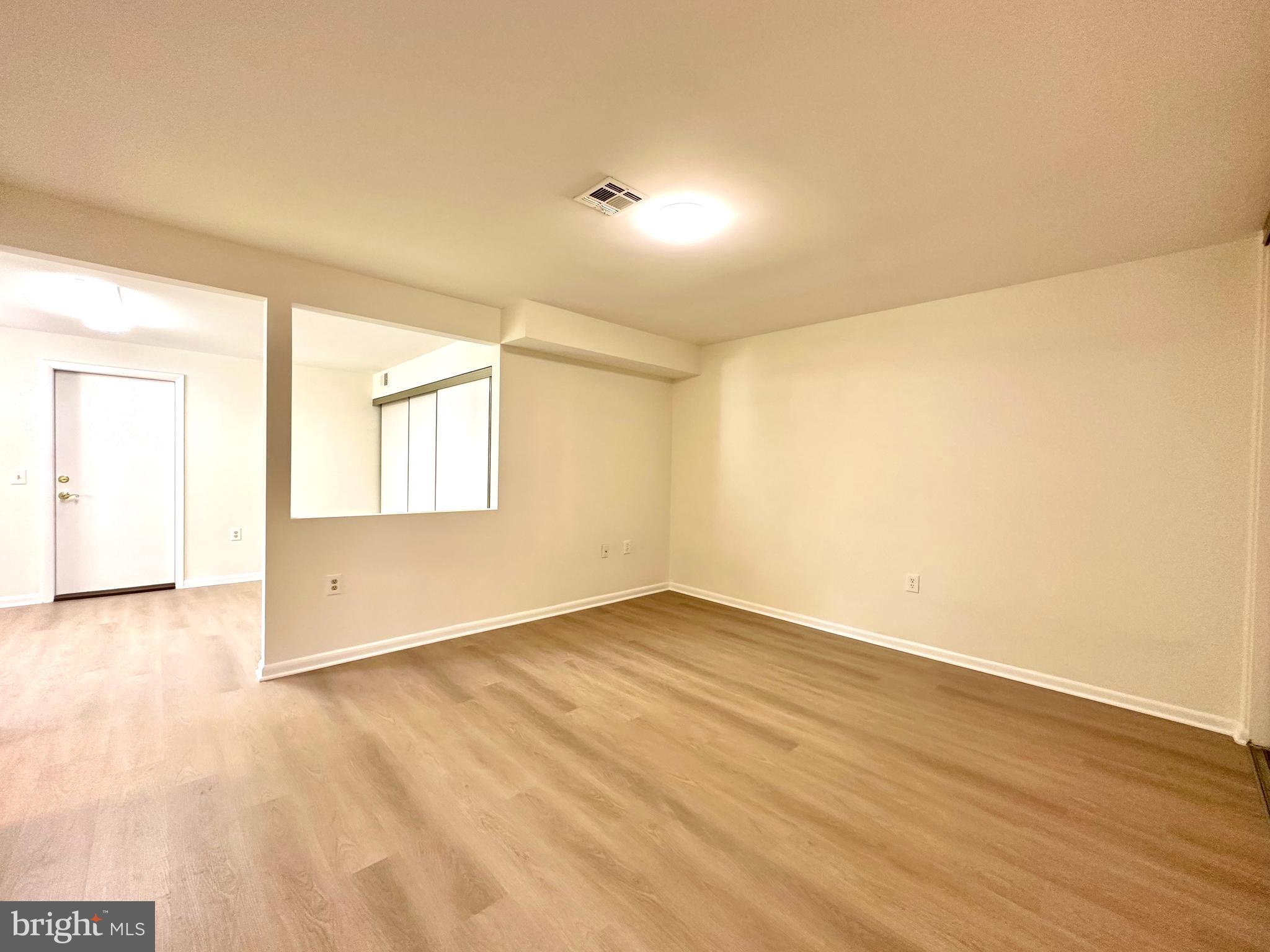 3309 Solomons Court, Unit 102C Silver Spring, MD 20906 - Photo 15 of 36 Primary bedroom also has Brand New LVT floors