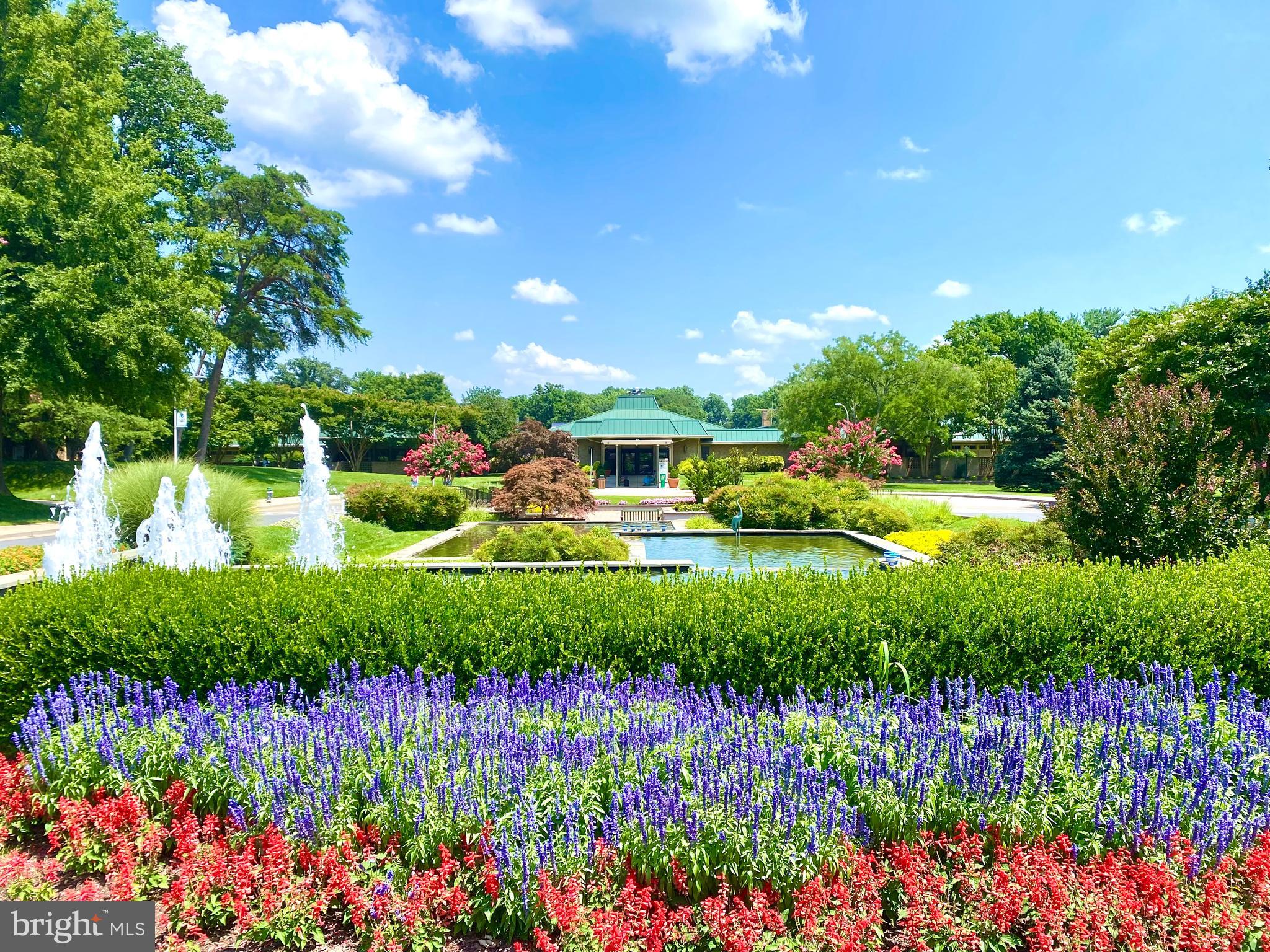 3309 Solomons Court, Unit 102C Silver Spring, MD 20906 - Photo 26 of 36 Beautiful Gardens in front of clubhouse one