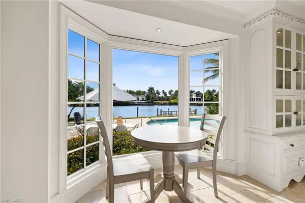 a kitchen with a counter space a sink and appliances