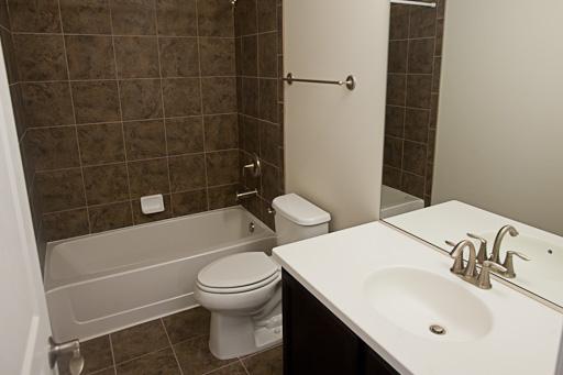 309 South NW Highway, Unit 2 Park Ridge, IL 60068 - Photo 11 of 11 a bathroom with a sink toilet and shower