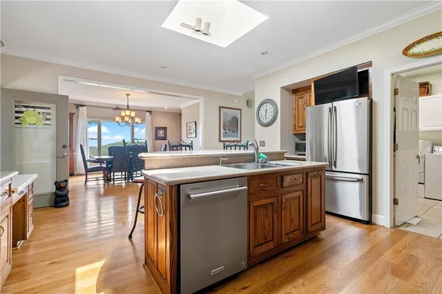 a bed room with couch and a window