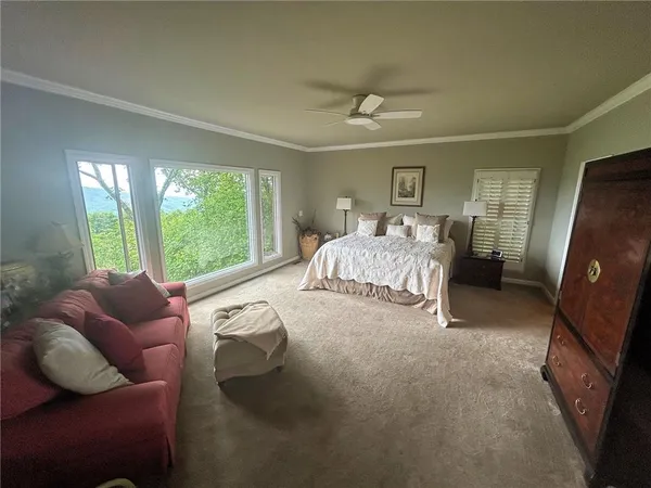 a bathroom with a shower and a sink