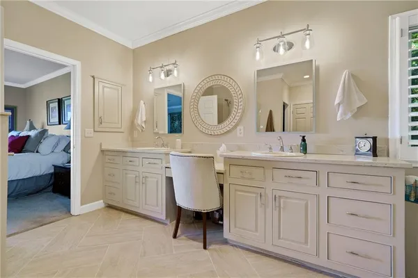 a bed room with furniture and a chandelier