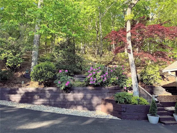 a living room with fireplace furniture and a fireplace