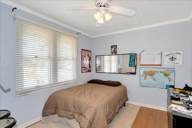 18424 Riegel Road Homewood, IL 60430 - Photo 14 of 25 a bedroom with a bed and a window