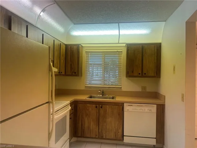 $1,650 | 4306 27th Court Southwest, Unit 103, Naples, FL 34116