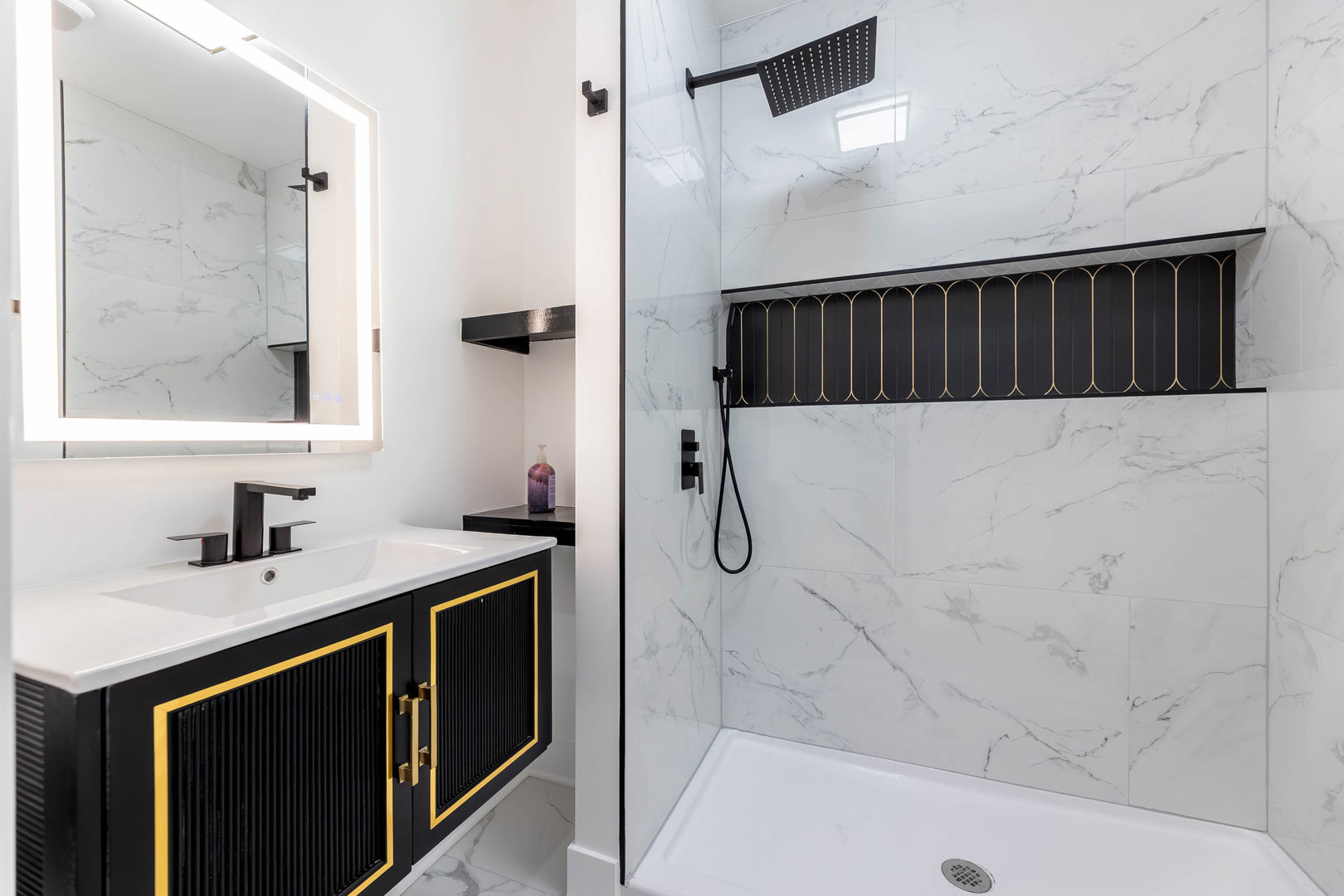 6742 South Carpenter Street Chicago, IL 60621 - Photo 12 of 36 a bathroom with a sink a vanity and a mirror