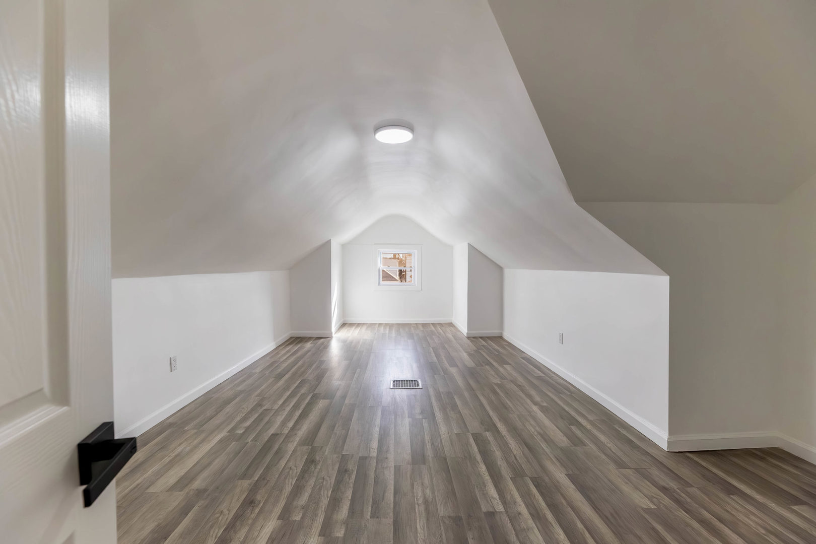 6742 South Carpenter Street Chicago, IL 60621 - Photo 15 of 36 a view of a hallway with wooden floor