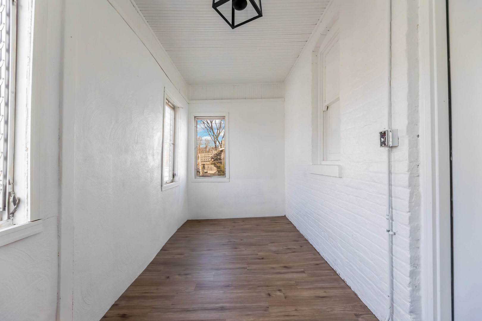 6742 South Carpenter Street Chicago, IL 60621 - Photo 29 of 36 a view of an entryway with wooden floor