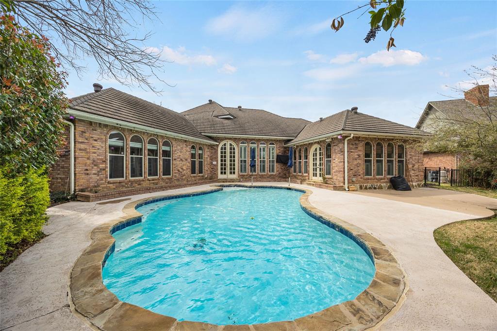 1201 Findlay Drive Arlington, TX 76012 - Photo 33 of 35 a view of a house with a swimming pool