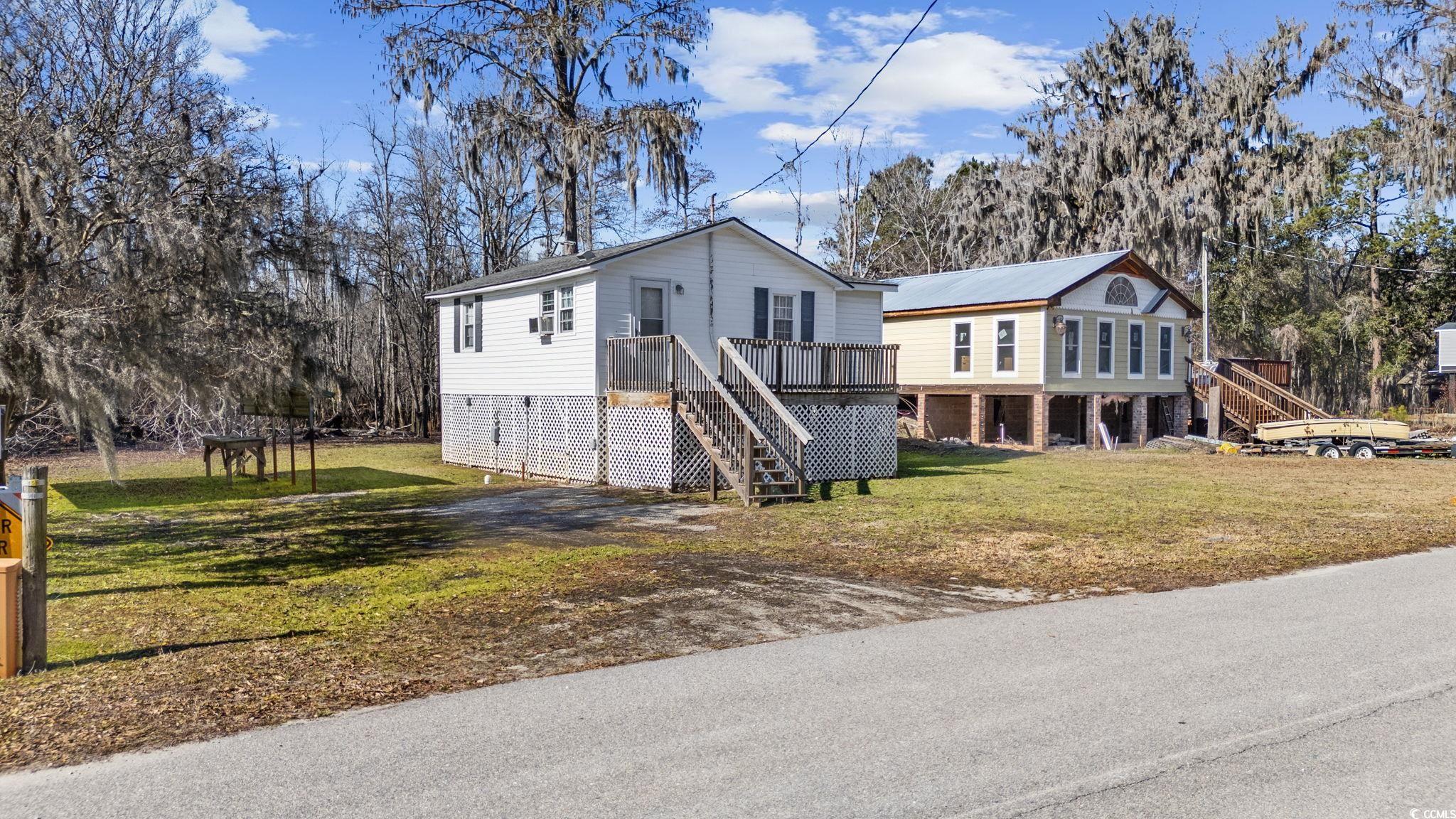 5078 Pitch Landing Road Conway, SC 29527 - Photo 21 of 31 View of front facade featuring a front yard and a