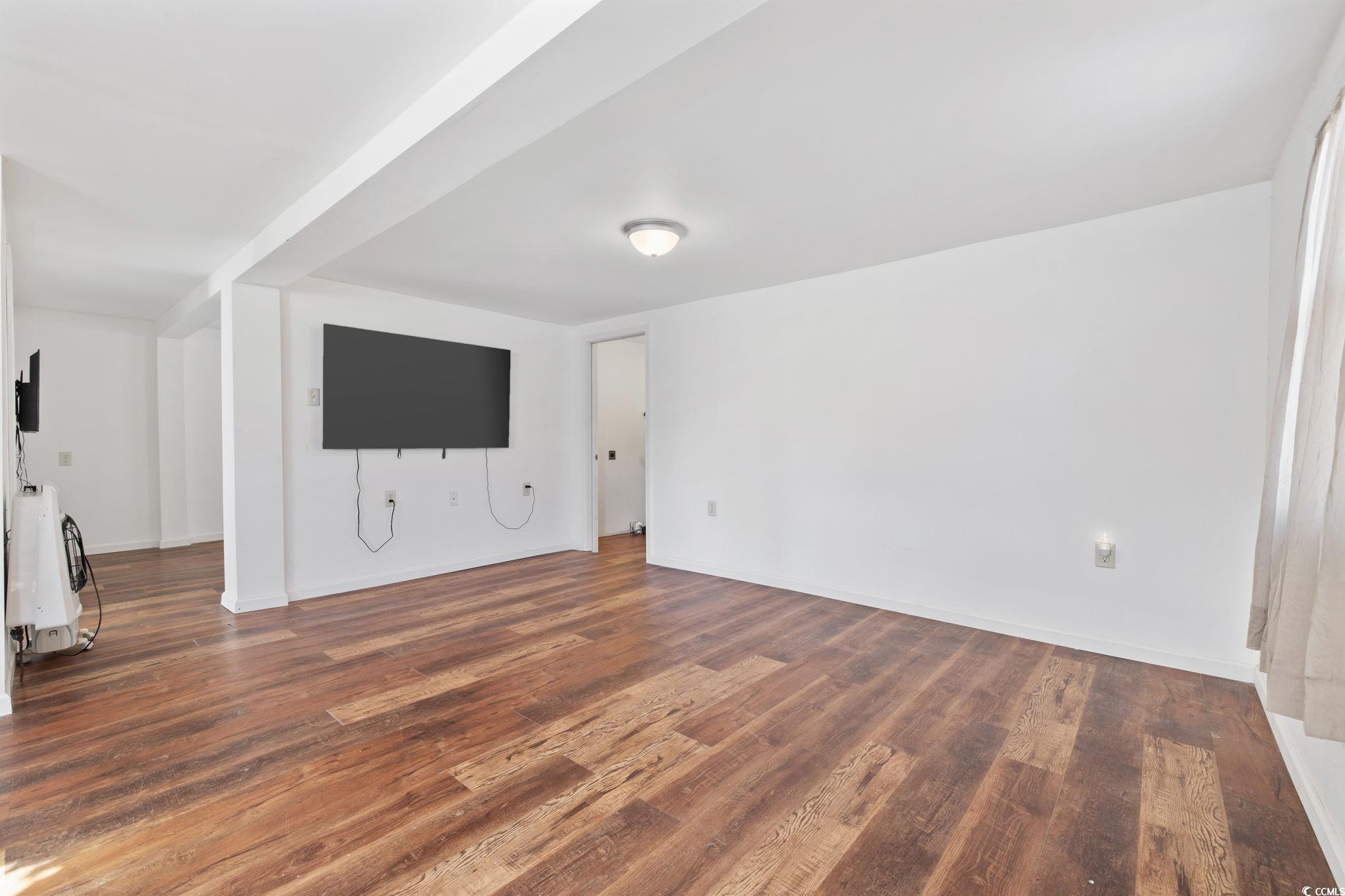 5078 Pitch Landing Road Conway, SC 29527 - Photo 7 of 31 Unfurnished living room featuring dark hardwood /