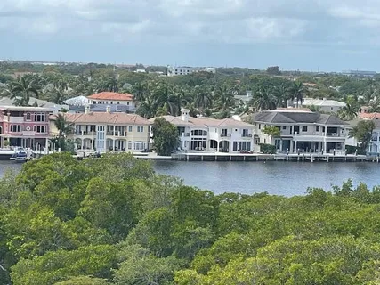 a view of a lake with building in front of it