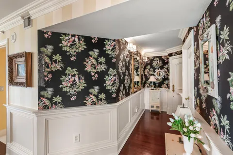 a view of entryway with wooden floor