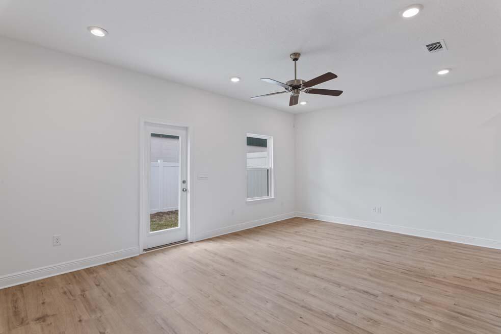 37 Phoenix Street Santa Rosa Beach, FL 32459 - Photo 4 of 26 an empty room with fan and windows