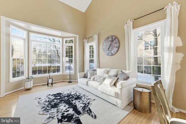 a kitchen with microwave a stove top oven and cabinets