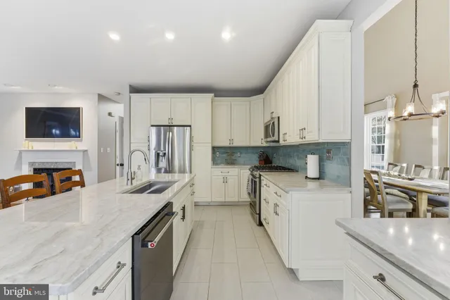 a living room with a couch and a window