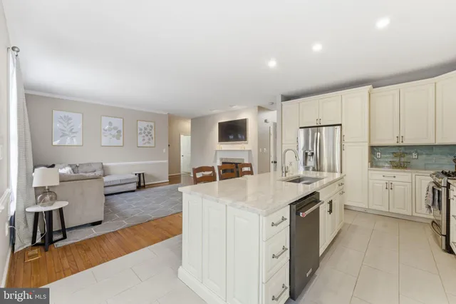 a bathroom with a sink a toilet and vanity