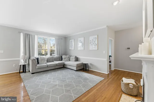 a spacious bathroom with a double vanity sink a mirror and a bathtub