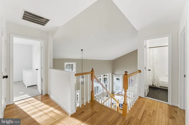 a bathroom with a tub and shower