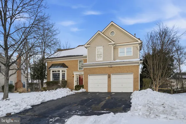 a view of a livingroom with furniture and front door