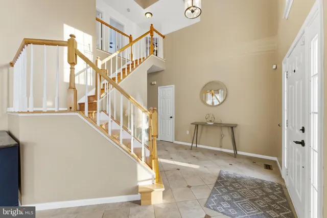 a view of a living room and dining room