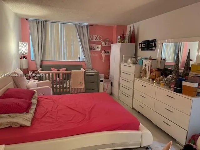 a room with furniture and a flat screen tv