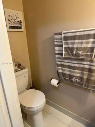 a bathroom with a toilet and a sink