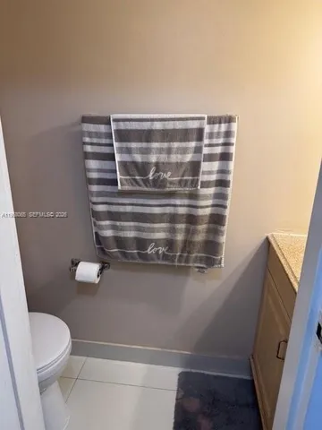 a view of bathroom with a sink and toilet