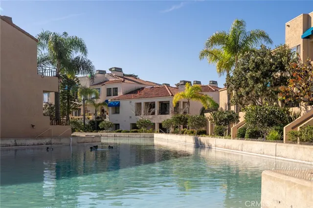 a house with river in front of it
