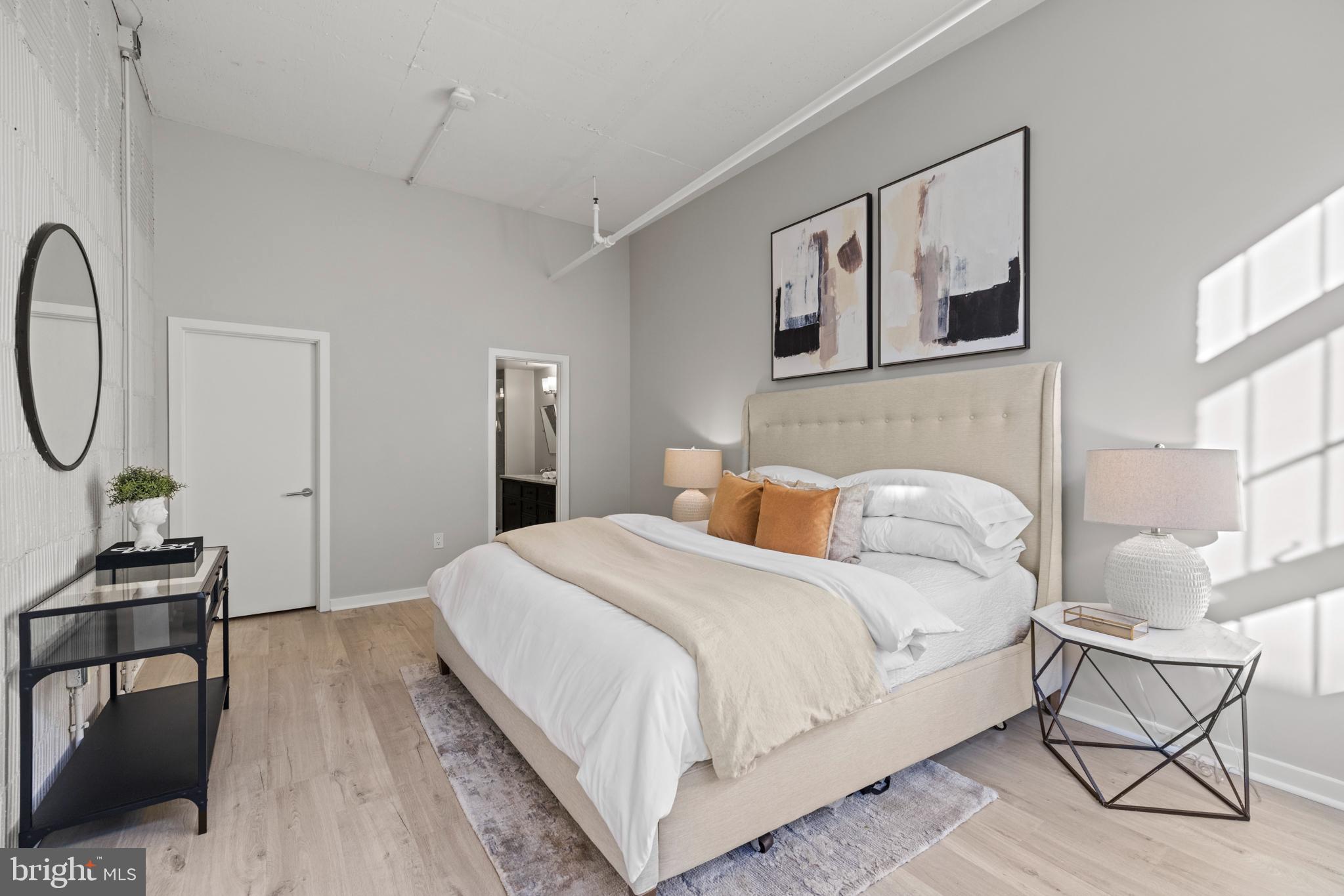 1401 Church Street Northwest, Unit 321 Washington, DC 20005 - Photo 11 of 33 a bedroom with a bed a desk and chair