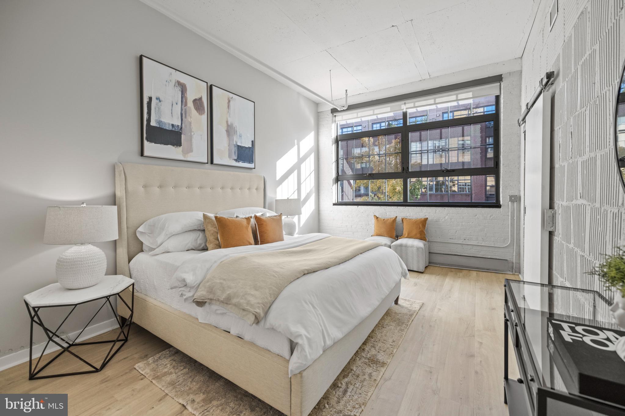 1401 Church Street Northwest, Unit 321 Washington, DC 20005 - Photo 13 of 33 a bedroom with a bed and window