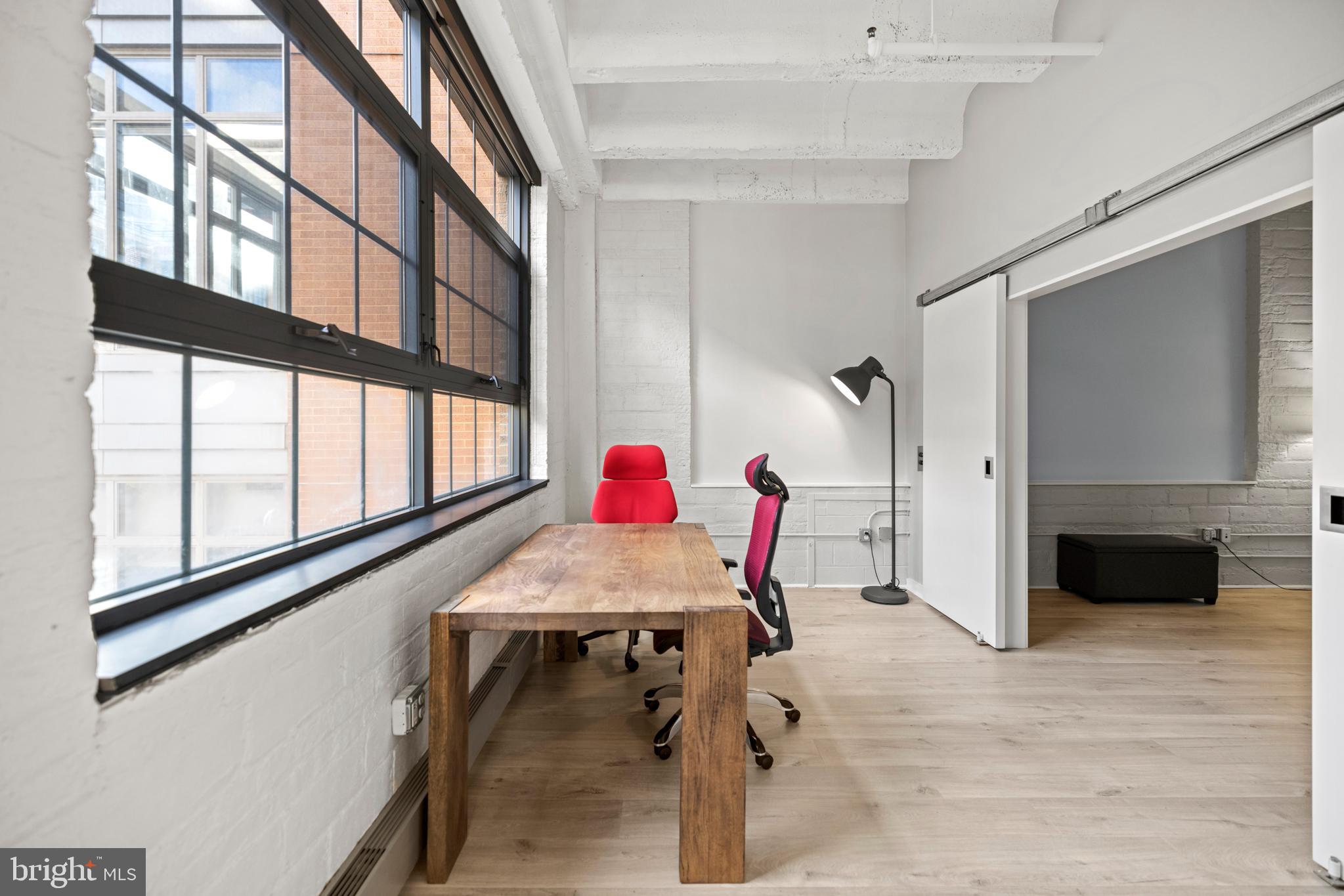 1401 Church Street Northwest, Unit 321 Washington, DC 20005 - Photo 18 of 33 a view of an entryway with furniture and a window