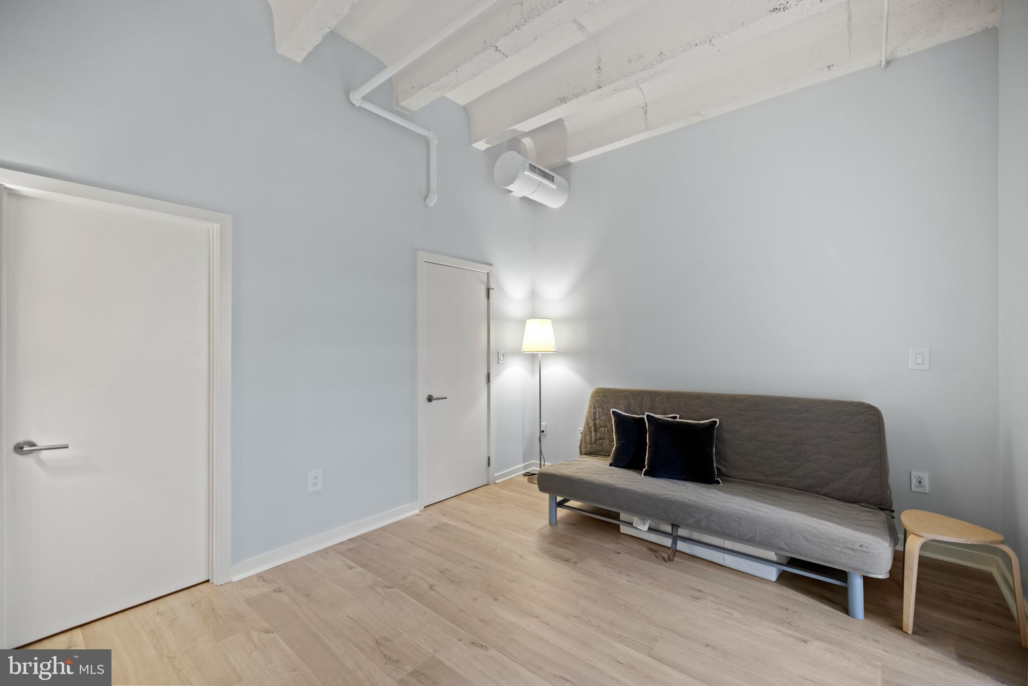 1401 Church Street Northwest, Unit 321 Washington, DC 20005 - Photo 20 of 33 a living room with furniture