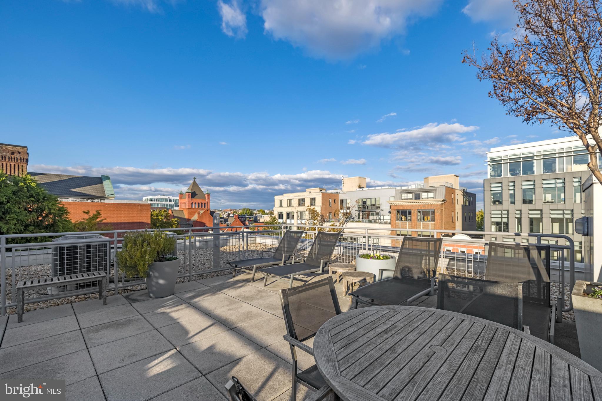 1401 Church Street Northwest, Unit 321 Washington, DC 20005 - Photo 28 of 33 a view of roof deck with patio
