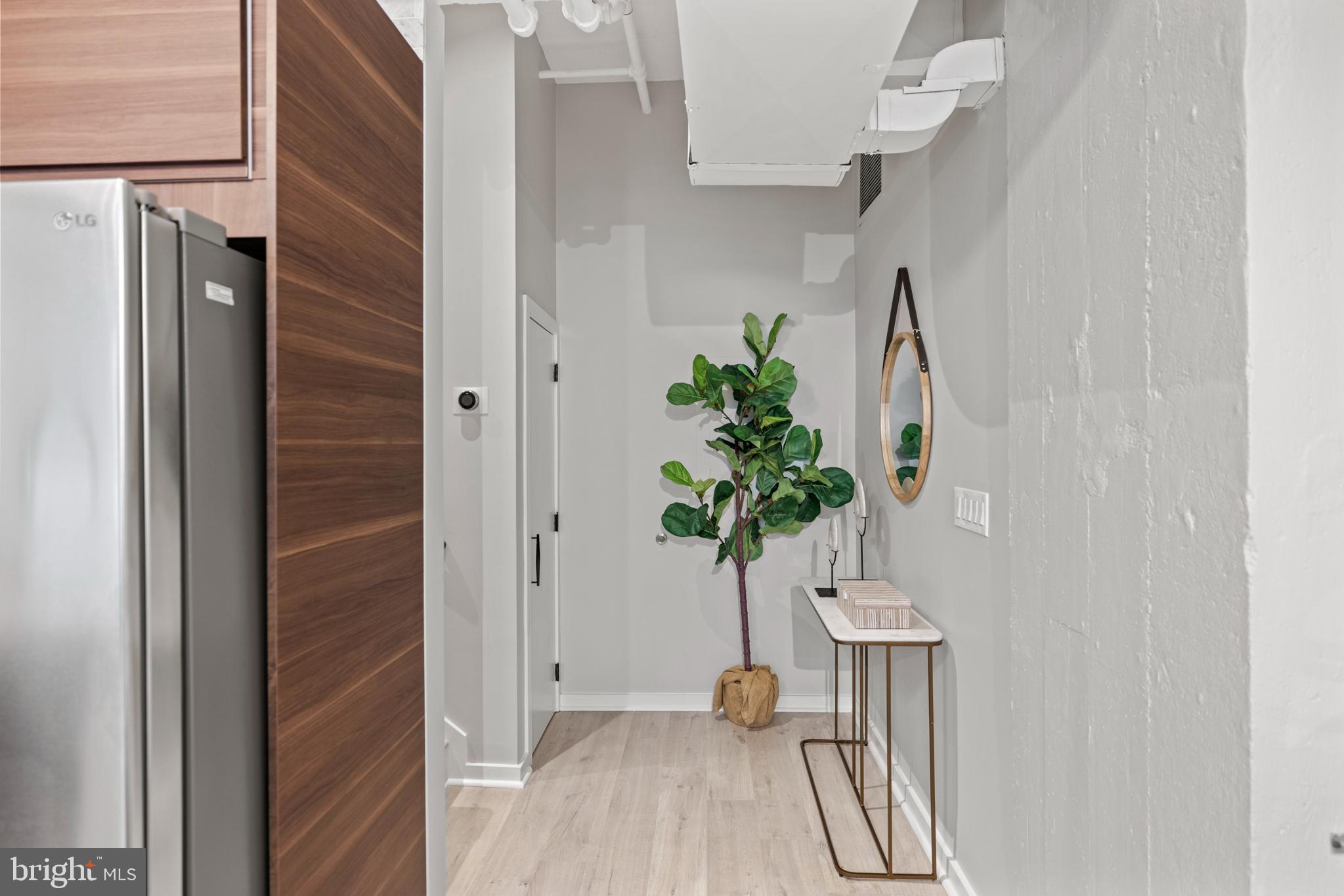 1401 Church Street Northwest, Unit 321 Washington, DC 20005 - Photo 5 of 33 a vase with flowers sitting on a table field