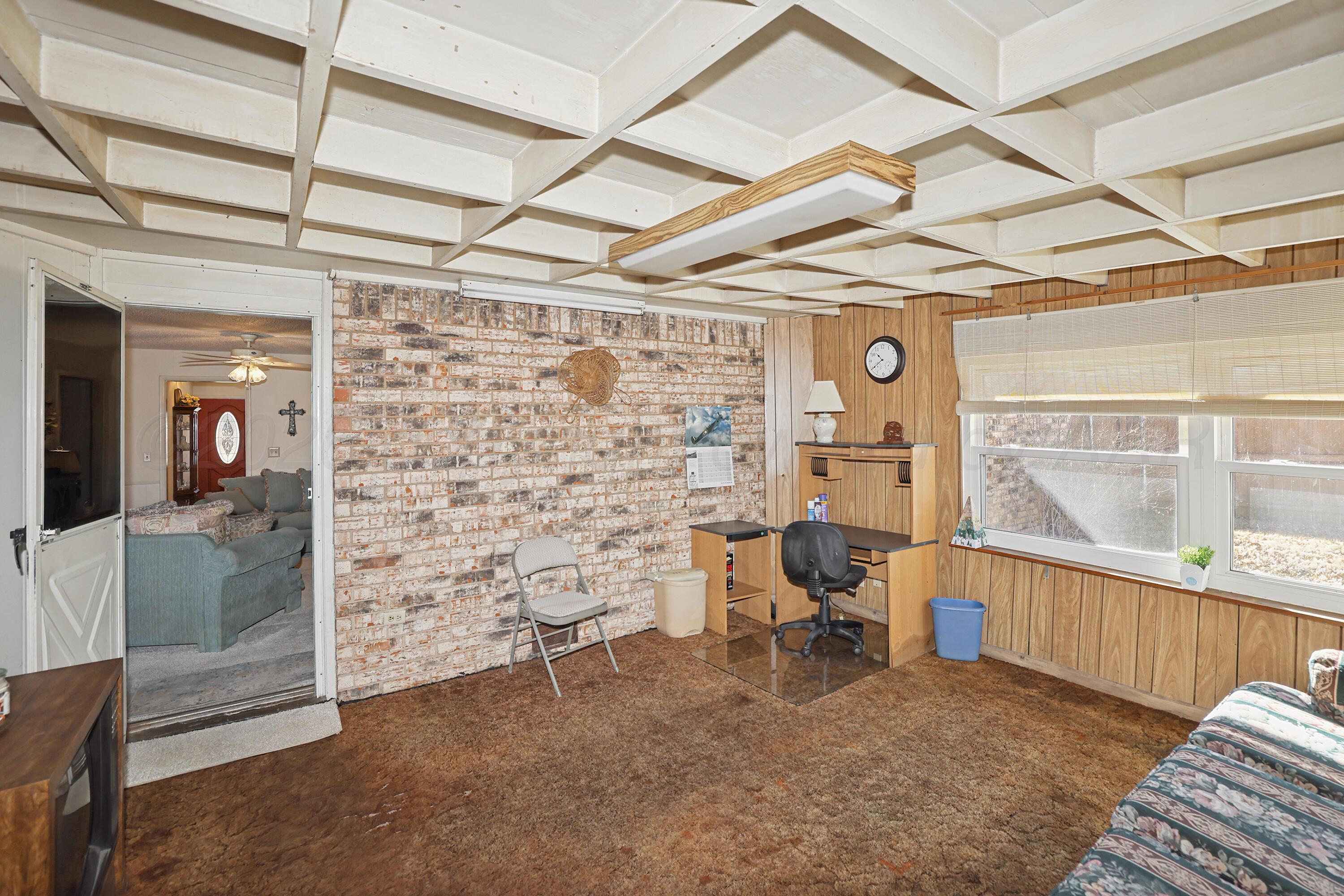 3708 Wayne Street Amarillo, TX 79109 - Photo 28 of 36 a view of a room with chair and windows
